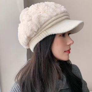 Cream-colored newsboy-style cap